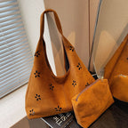 Women's hobo bag with floral accent and practical mini wallet