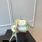 Women's mini handbag with cheerful cherry design and charming pendants
