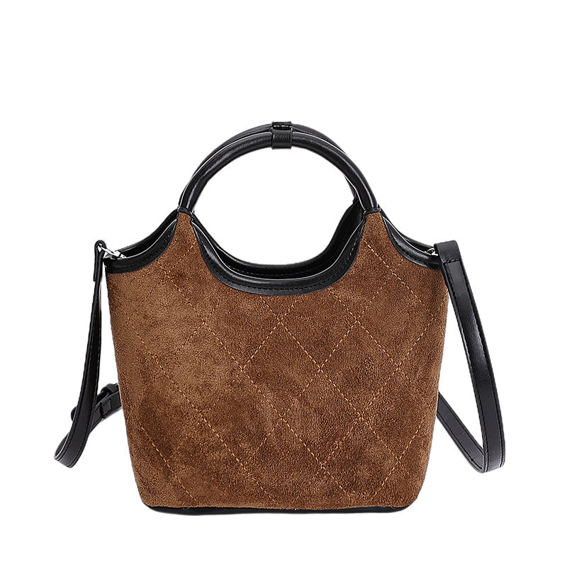 Ladies elegant handbag with high-quality suede and leather accents