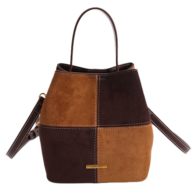 Women’s mini hobo bag made of high-quality suede leather with decorative stitching