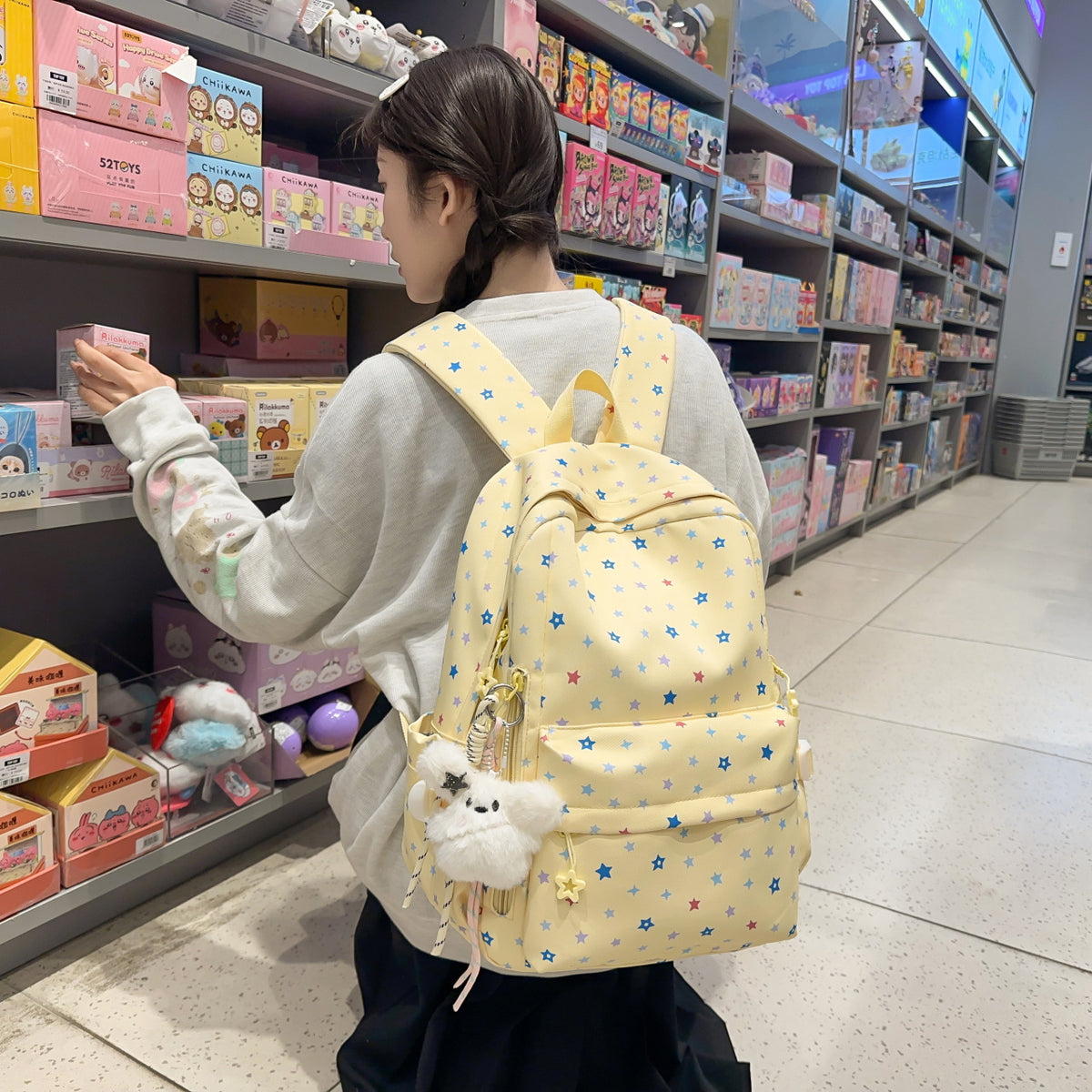 Backpack with Playful Star Pattern and Practical Storage Compartment
