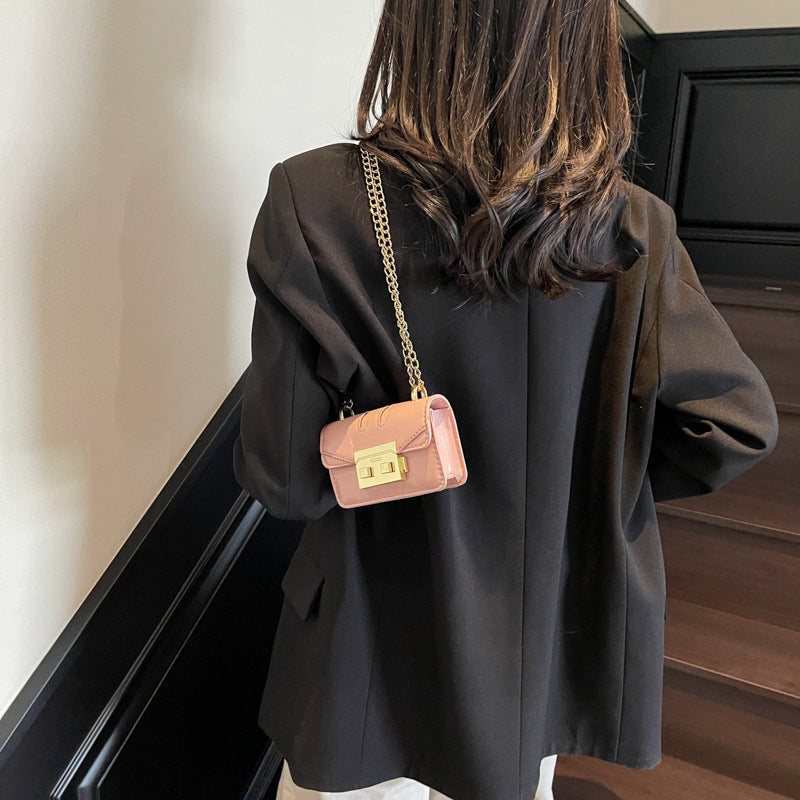 Women's mini handbag with elegant metal accents