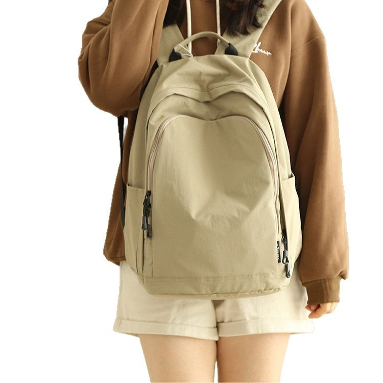 Practical everyday backpack with reinforced bottom and versatile compartments