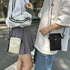 Practical Shoulder Bag with Water-Repellent Material and Adjustable Shoulder Strap