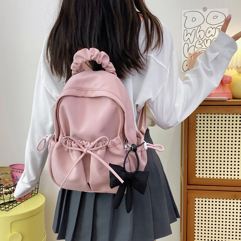 Fashionable backpack with playful details