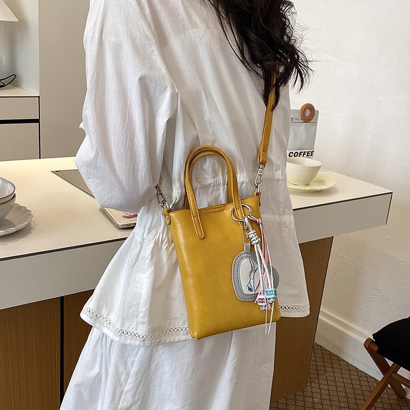 Ladies mini handbag with elegant pendant