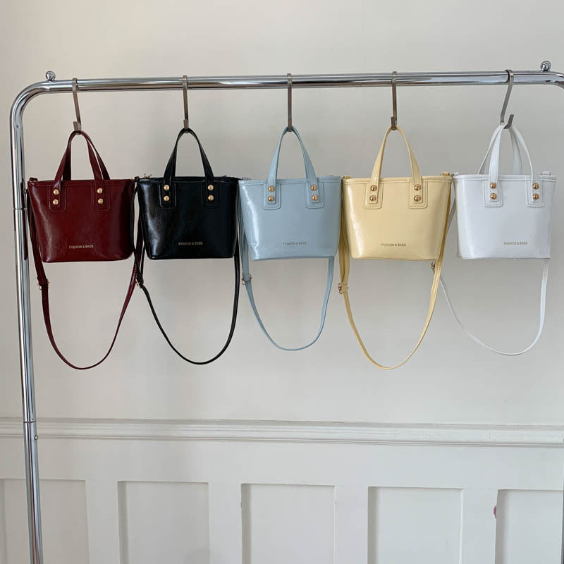 Ladies Mini-Handbag with elegant carry handle and practical inner compartment