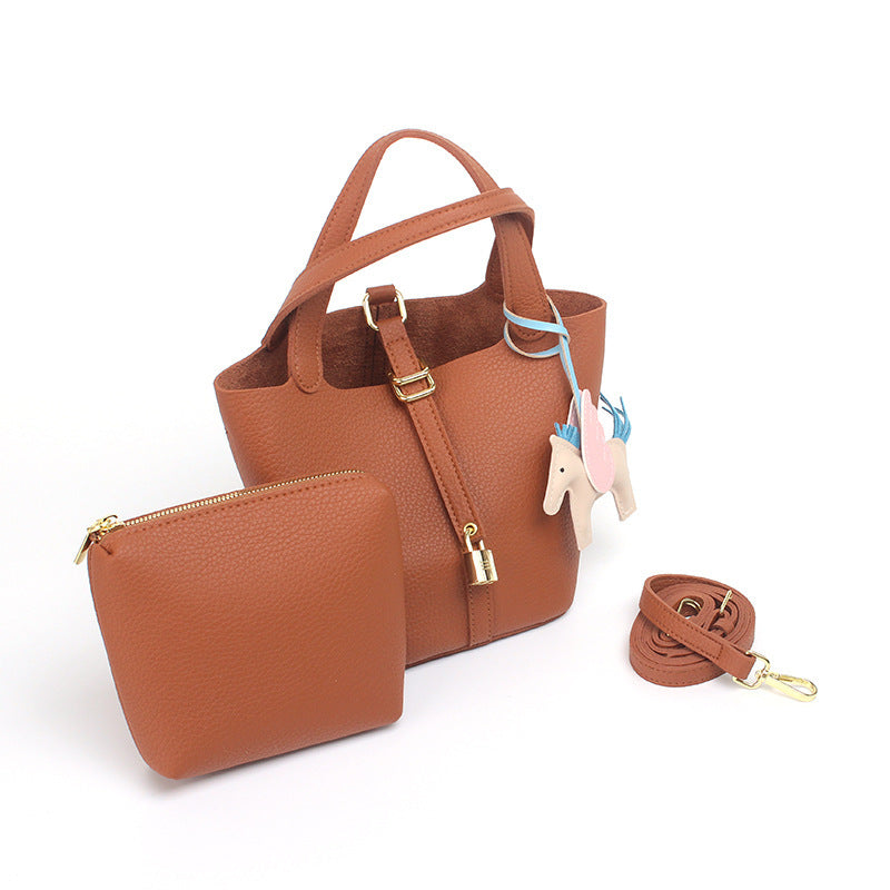 Women's hobo bag with removable mini organizer and charming animal pendant