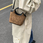 Ladies elegant handbag with high-quality suede and leather accents