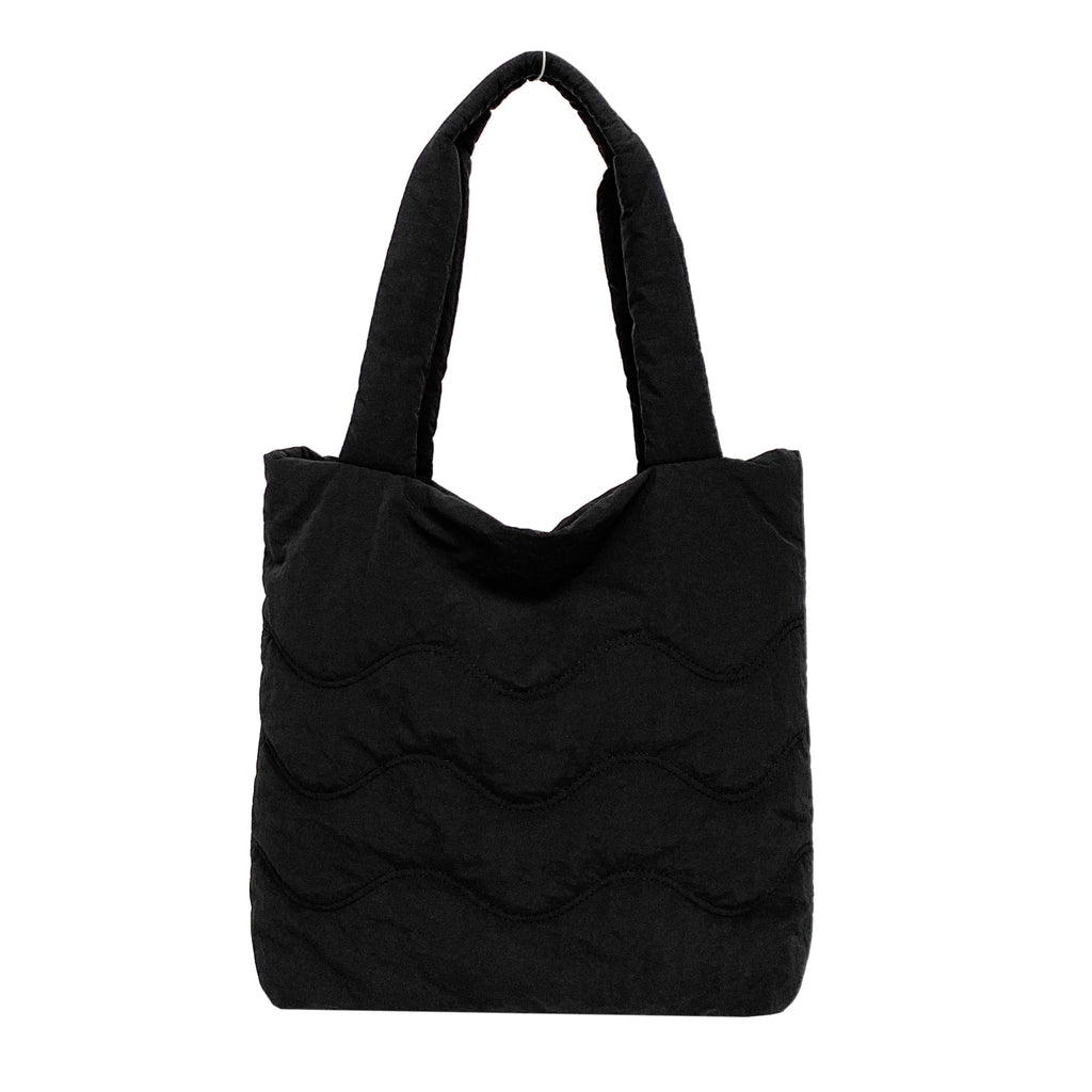 Padded shoulder bag with wave design