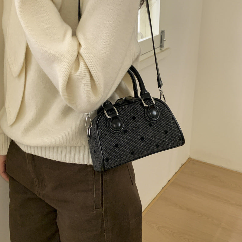 Women’s mini handbag made of high-quality material with a textured surface