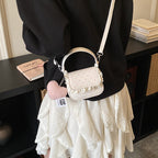 Women’s mini handbag with playful design and unique details