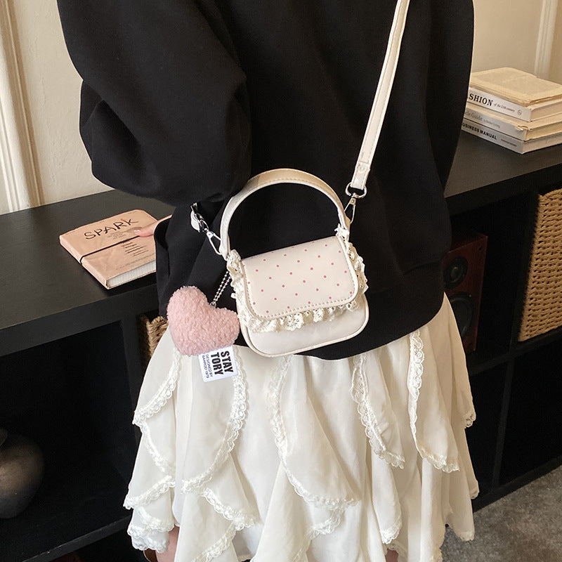 Women’s mini handbag with playful design and unique details