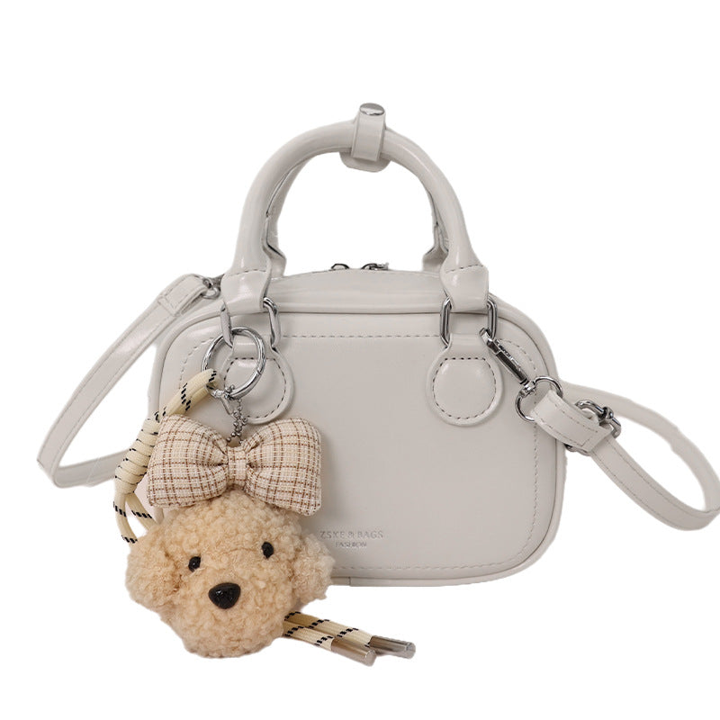 Women's mini handbag with detachable plush charm