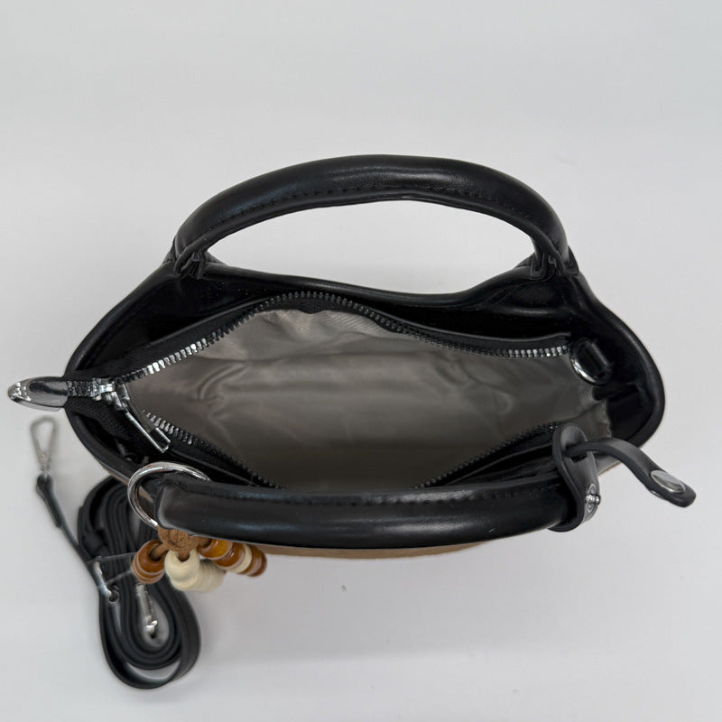 Ladies elegant handbag with high-quality suede and leather accents