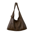 Women's hobo bag with floral design and practical mini organizer