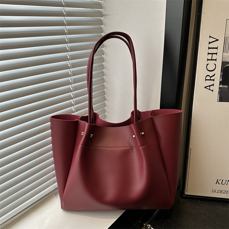 Ladies tote bag with elegant minimalist structure and sturdy carrying handles-https://detail.1688.com/offer/1027680059148.html-Calm Wears-Rot-nothing-Calm Wears