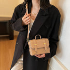 Women's mini handbag with textured design and detachable shoulder strap