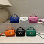 Women’s mini handbag with elegant bow decoration