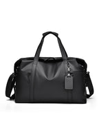 Travel bag with waterproof material and practical carrying options