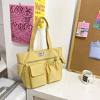 Tote bag with versatile compartments and ergonomic design