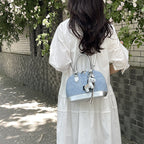 Women's mini handbag with animal charm and fashionable denim