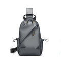Sling backpack with flexible compartment layout and water-repellent material