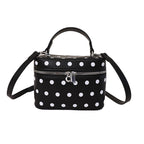 Women's mini handbag with playful design and elegant accents