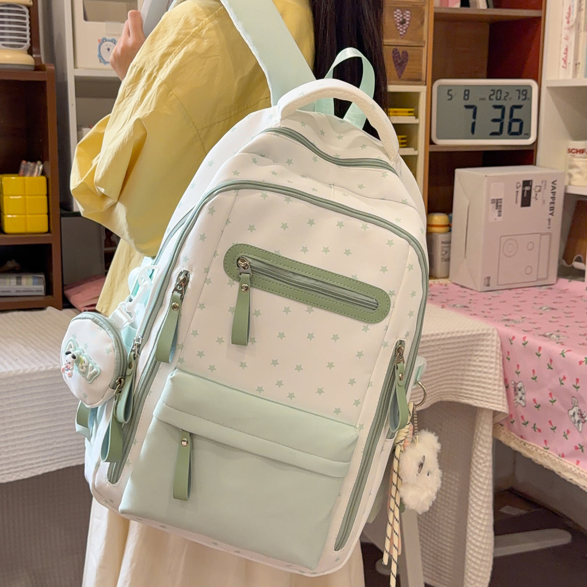 Backpack with Charming Star Applications and Practical Compartments