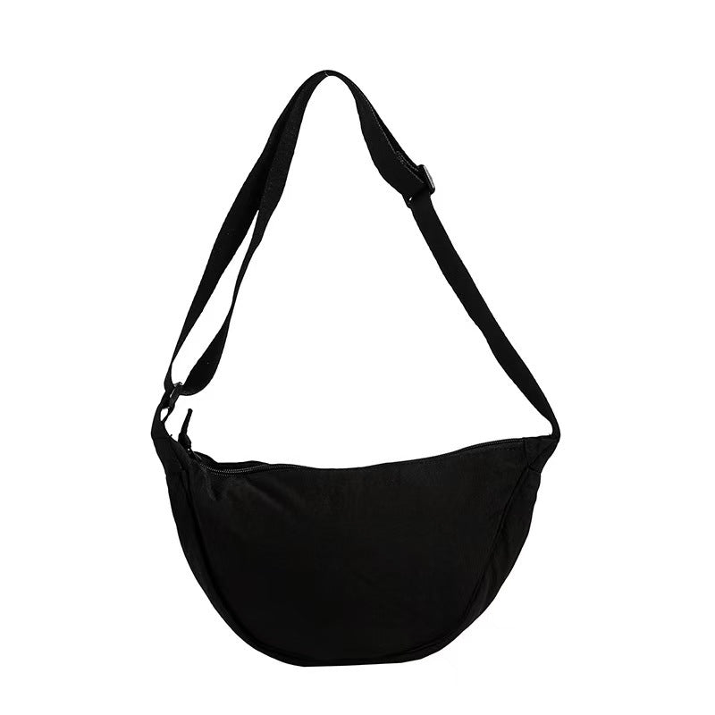 Shoulder bag with adjustable shoulder strap and practical compartments