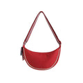 Shoulder bag with adjustable shoulder strap and versatile interior compartment