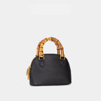 Ladies fashionable mini bag with bamboo handle and elegant leather