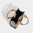 Women's mini handbag with trendy denim elements and practical drawstring