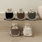 Ladies stylish mini handbag with drawstring and pearl accent