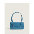 Ladies elegant handbag with minimalist silhouette