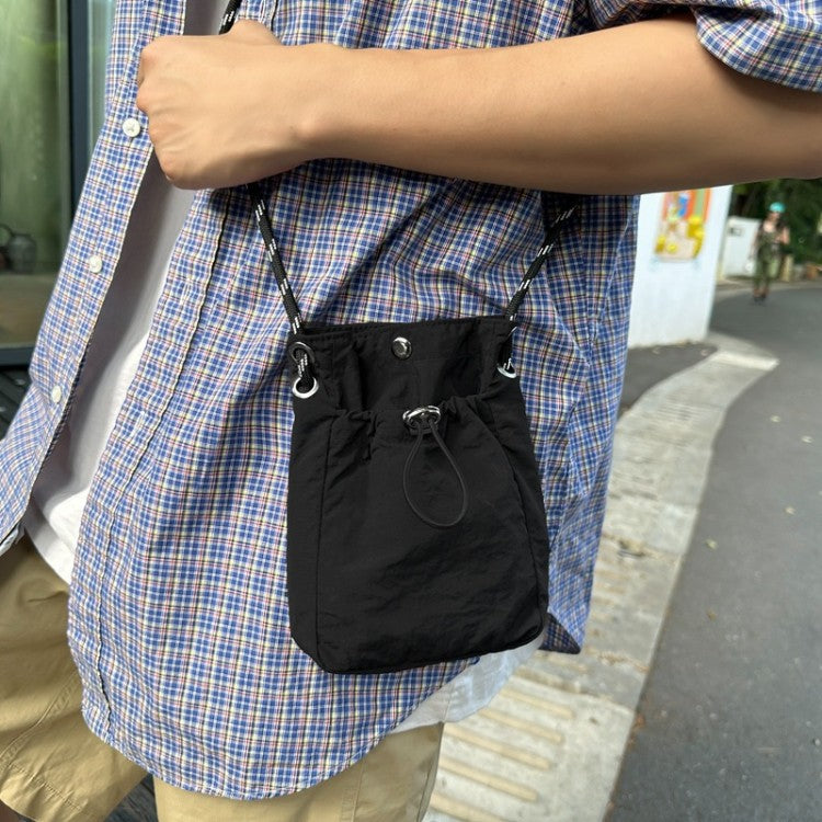 Mini Drawstring Crossbody Bag