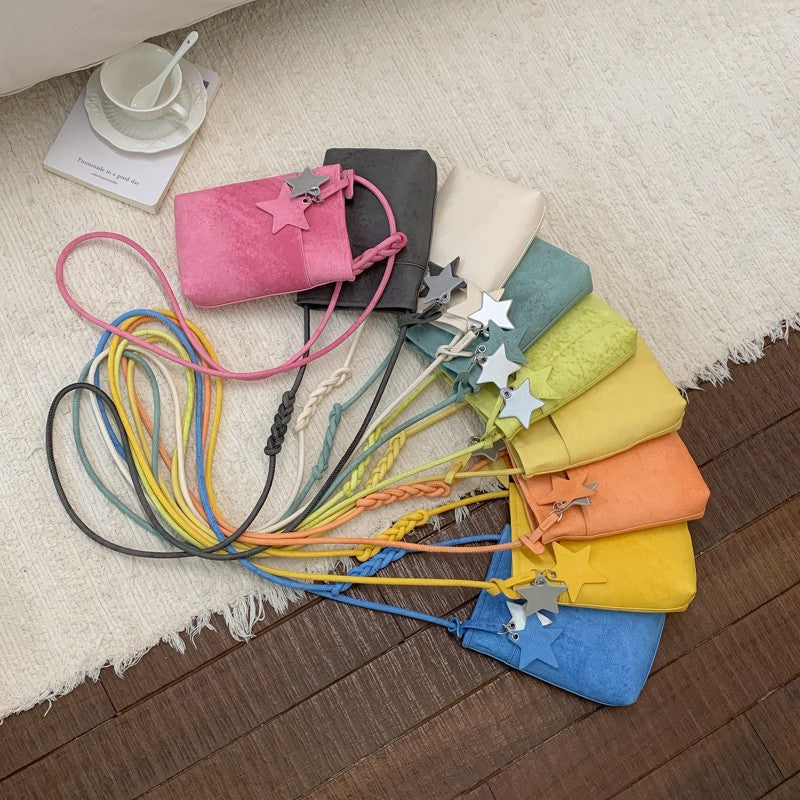 Fashionable shoulder bag with braided shoulder strap