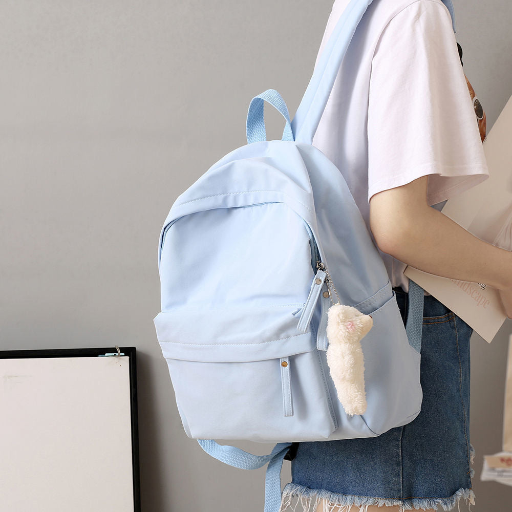 Casual Backpack with Plush Keychain