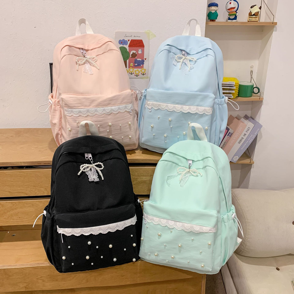 Backpack with elegant pearl applications and intricate design