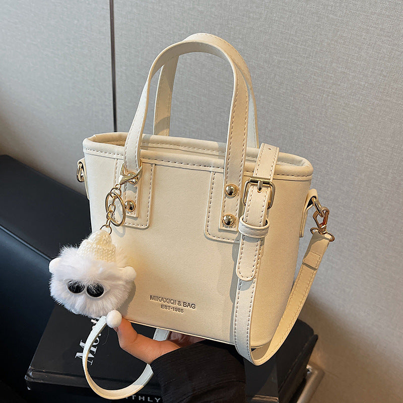 Women’s mini bag with detachable plush pendant