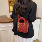 Ladies elegant mini handbag with quilted design