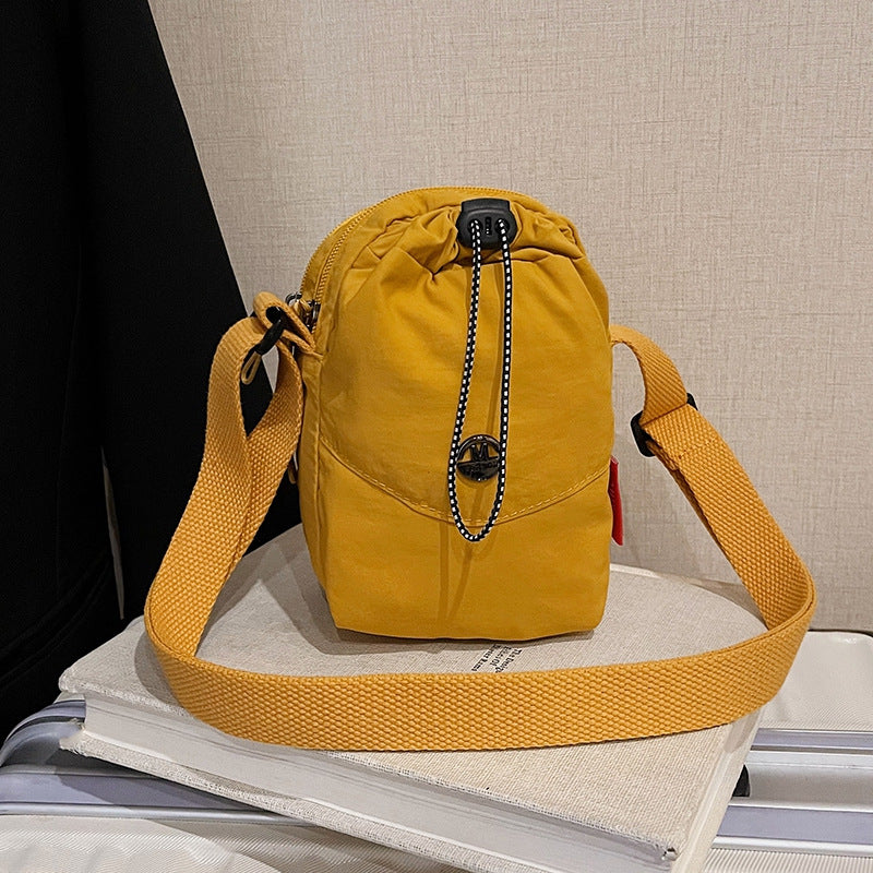 WoCompact Drawstring Crossbody Bag