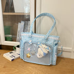 Handbag with Transparent Compartment Division and Playful Application Design