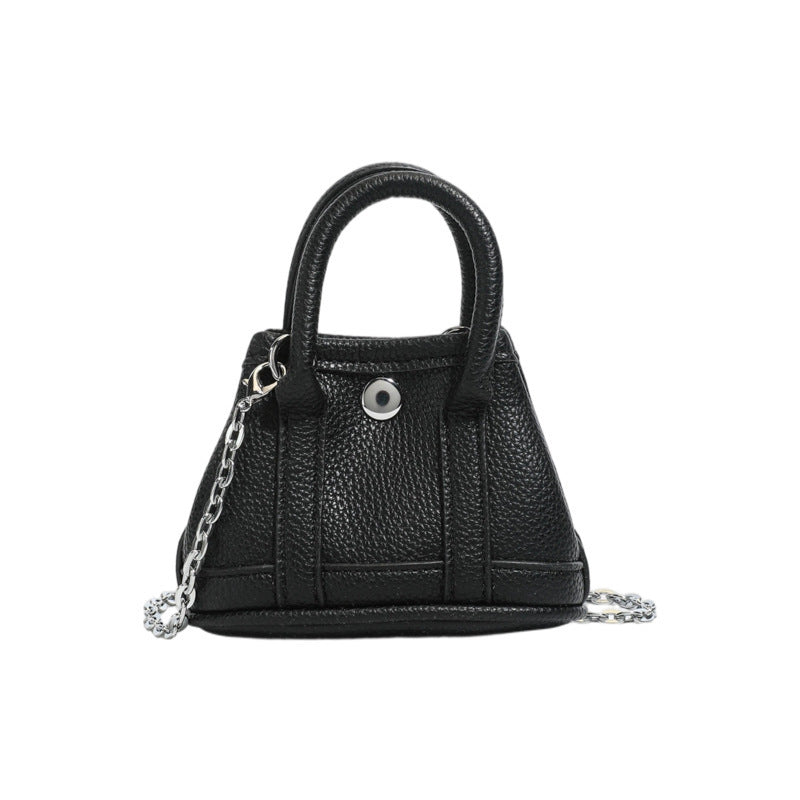 Ladies mini handbag with smooth structure and removable chain strap
