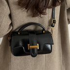 Ladies elegant mini handbag with practical carrying handle and removable shoulder strap