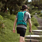 Sporty backpack with breathable mesh inserts and elastic carrying straps