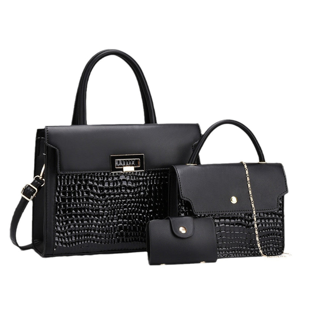 Ladies handbag set with luxurious crocodile leather look and removable clutch