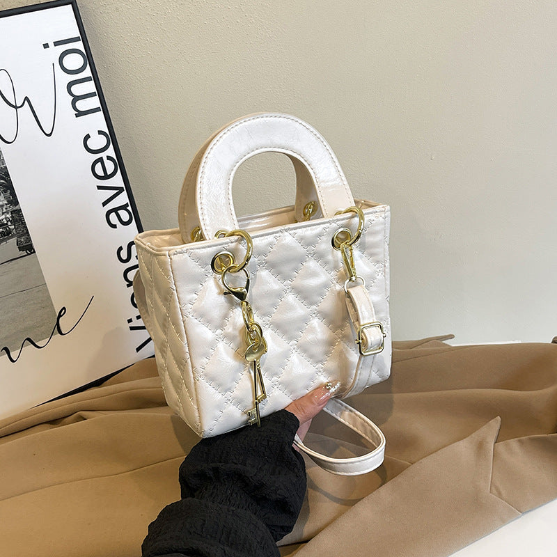 Ladies elegant mini handbag with quilted design