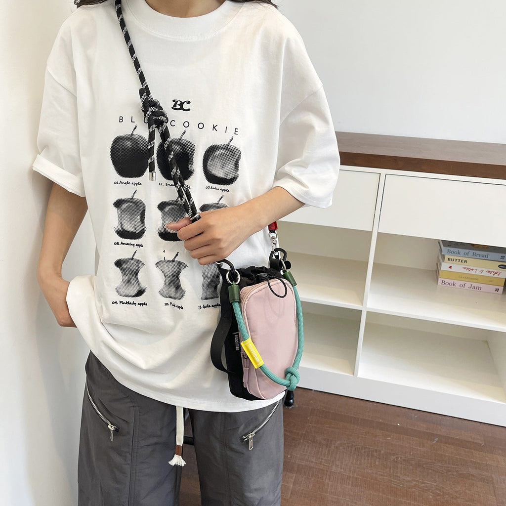 Women's multifunctional mini crossbody bag made of durable material with adjustable shoulder strap