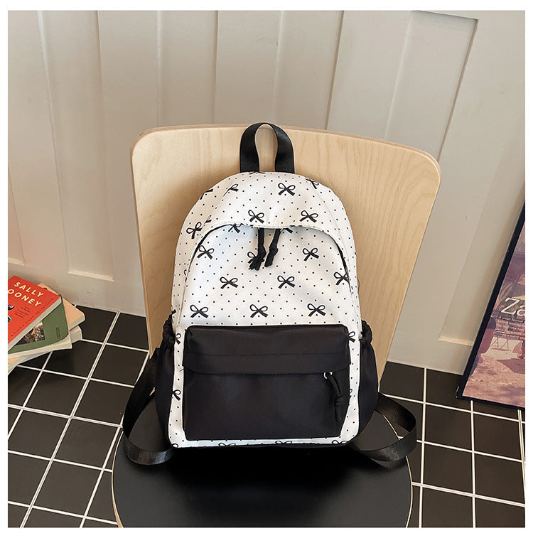 Cute everyday backpack with embroidered bows